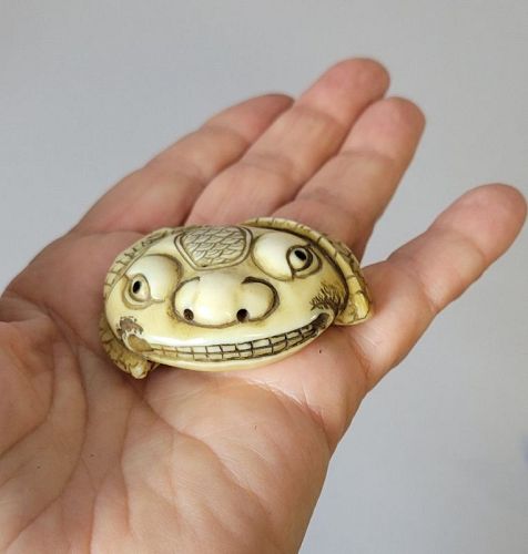 Japanese Bone Netsuke with Concealed Dragon and Frog Mask, Edo